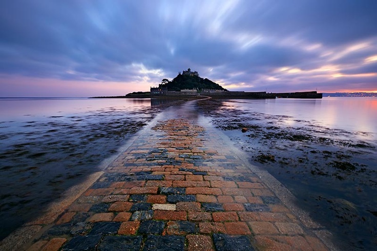 The tide begins its return, water lapping at the edge of the causeway at St Michael's Mount